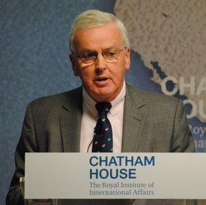 Sir John Holmes at Chatham House 2016.jpg