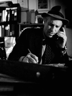 Greg Palast in his NYC office.jpeg